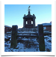 Lymm Cross in winter - Dave Teehan